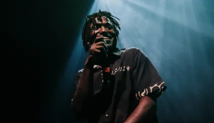man in black shirt performing 